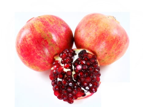 pomegranate and its part. Isolated on a white background.