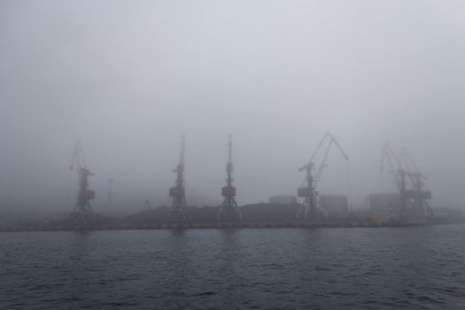 Seaport in a fog early in the morning