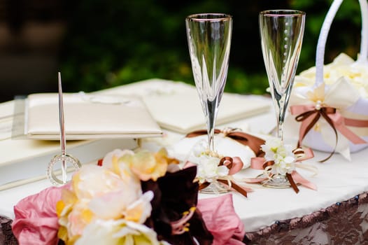 Pair of wedding wineglasses on the table