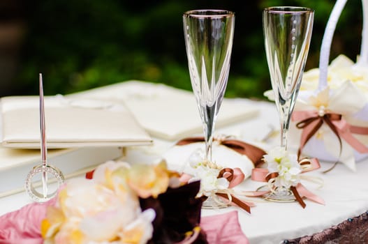 Pair of wedding wineglasses on the table