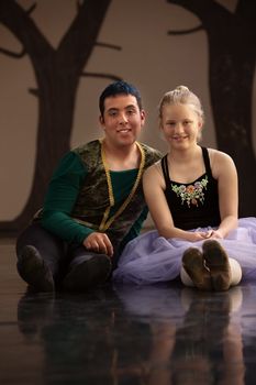 Young blond ballet student with handsome instructor