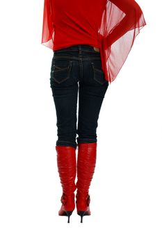 woman in red boots and a blouse from the back on a white background