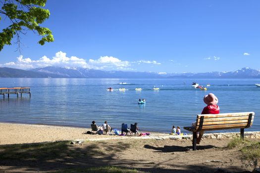 Beach activities and Lake Tahoe scenic view, California.