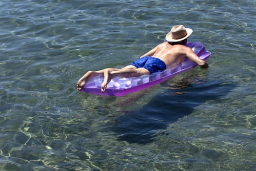 Enjoying a cool float on Lake Tahoe water, CA.