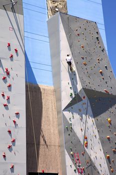 Fixing fixutures for climbing on a wall's building, Reno NV.