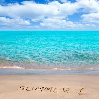 Caribbean tropical beach with Summer word written in sand