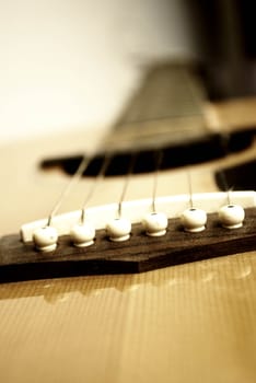 detail of classic guitar with shallow depth of field