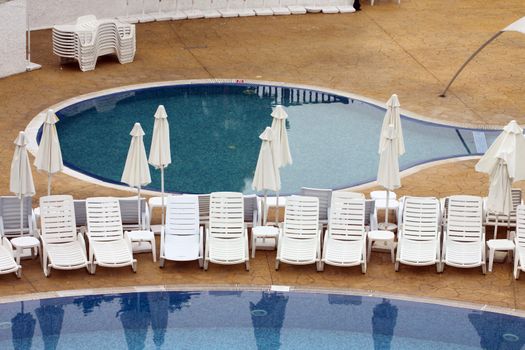 sun lounges by the Swimming Pool 