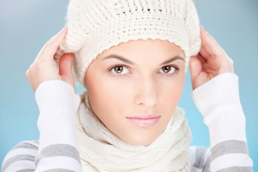 pretty woman with scarf and winter cap