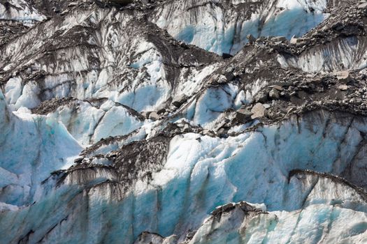 Blue turquoise glacier icefall frozen ice background texture pattern