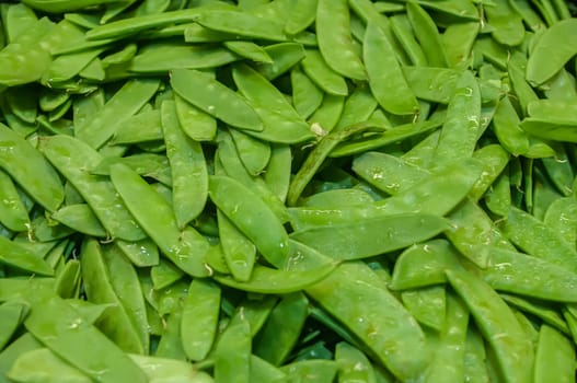 Freshly harvested peas on display at the farmers market