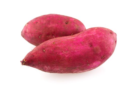 Sweet potatoes isolated on white.