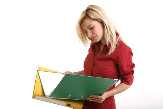 Pretty girl looking at folders