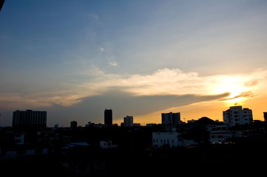 silhouette of building before sundown