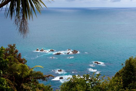 Unusual calm Tasman Sea at West Coast of South Island of New Zealand