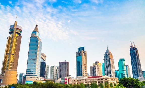 District Shanghai downtown skyscraper on white and blue sky in prospective view