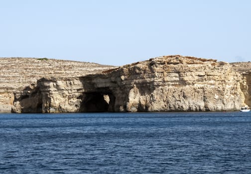 Blue sea and rocks on the malta beach