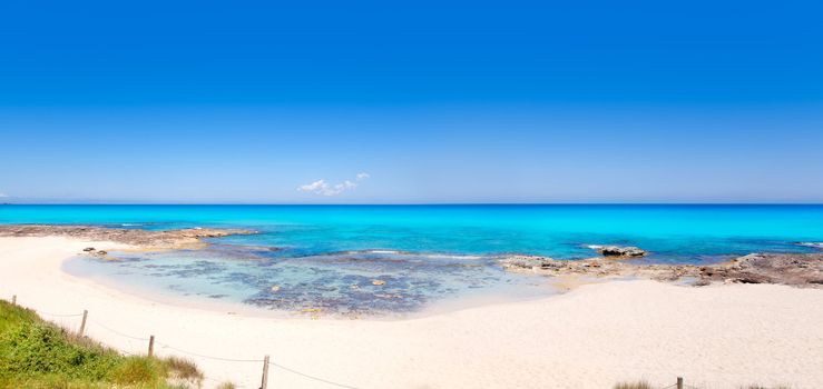 Formentera Es Calo beach with turquoise sea in Mediterranean balearic islands