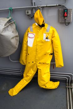 Rescue Dummy on war ship cabin wall