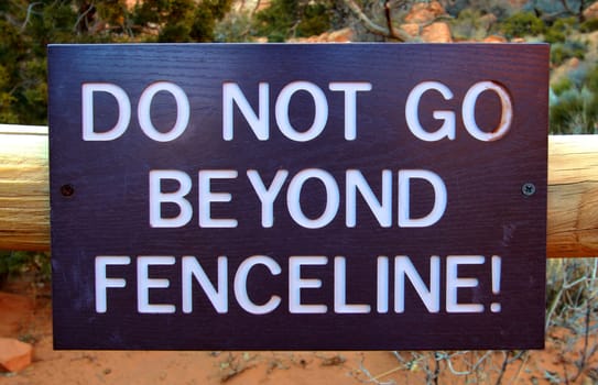 Sign reading Do Not Go Beyond Fenceline in a United States national park.