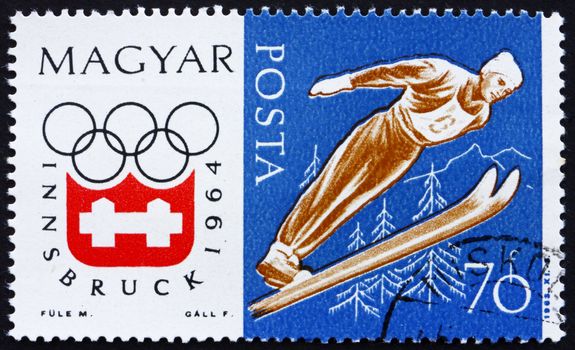 HUNGARY - CIRCA 1963: a stamp printed in the Hungary shows Ski Jumping, Winter Olympic sports, Innsbruck 64, circa 1963