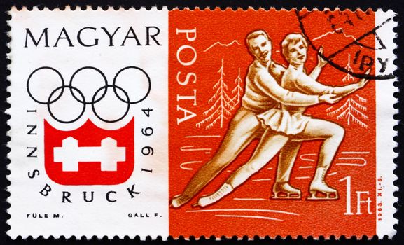 HUNGARY - CIRCA 1963: a stamp printed in the Hungary shows Figure Skating, Pair, Winter Olympic sports, Innsbruck 64, circa 1963