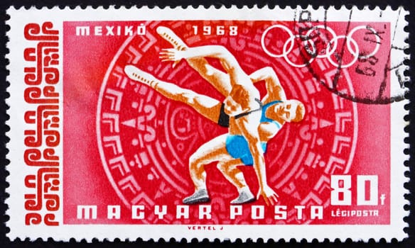 HUNGARY - CIRCA 1968: a stamp printed in the Hungary shows Wrestling, Summer Olympic sports, Mexico 68, circa 1968