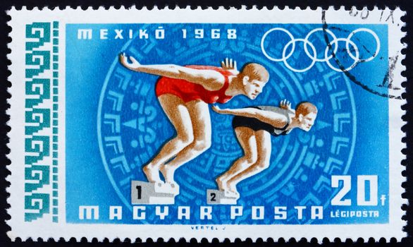 HUNGARY - CIRCA 1968: a stamp printed in the Hungary shows Women Swimmers, Summer Olympic sports, Mexico 68, circa 1968