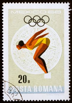 ROMANIA - CIRCA 1968: a stamp printed in the Romania shows Woman Diver, Summer Olympic sports, Mexico 68, circa 1968