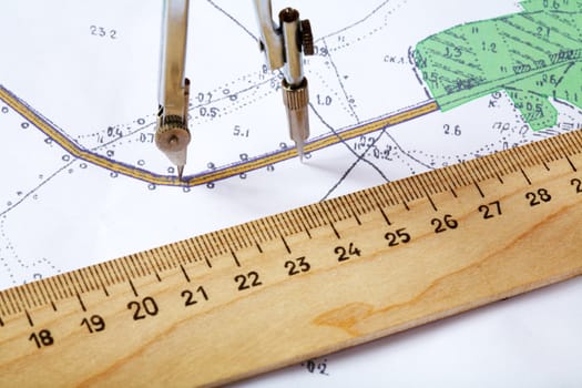 Topographic map of district with  measuring instrument and  ruler