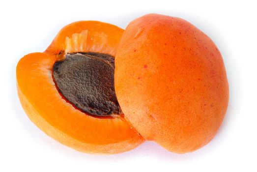 appetizing ripe orange apricot closeup macro over white background