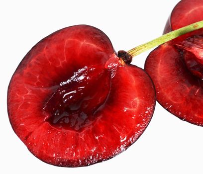 one ripe red cherry on white background