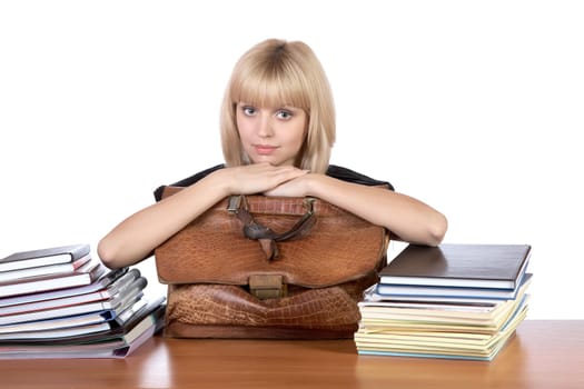 The girl with an old briefcase in hands on a white background