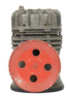 Old air compressor with pulley, isolated on white background