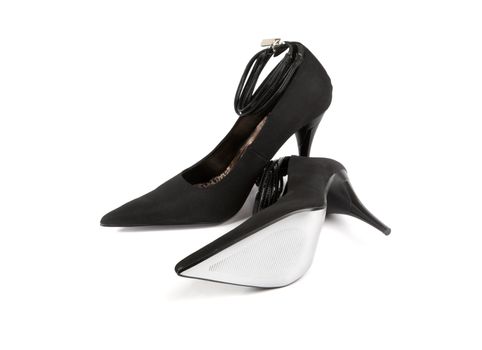 Woman black shoes on the white background