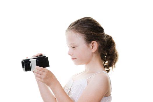 preteen girl with camcorder isolated on white