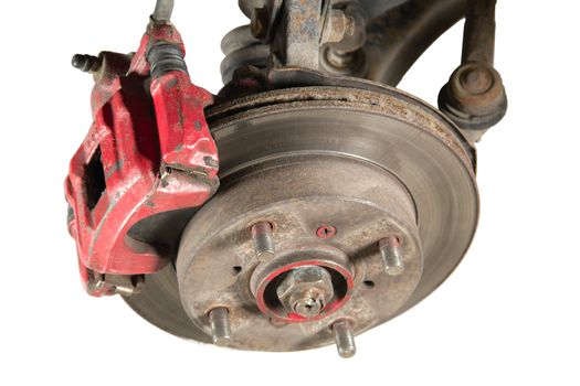 Old brake pads and disk, isolated on a white background