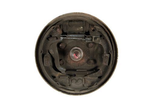 Old brake pads and cylinder brake drum, isolated on a white background