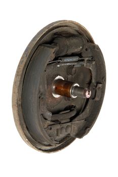 Old brake pads and cylinder brake drum, isolated on a white background