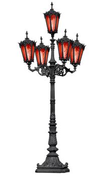 The old cast iron lamp post with red glass isolated on white background