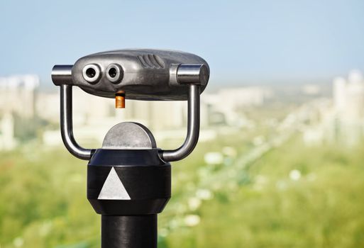 Binoculars to observe green city from a height