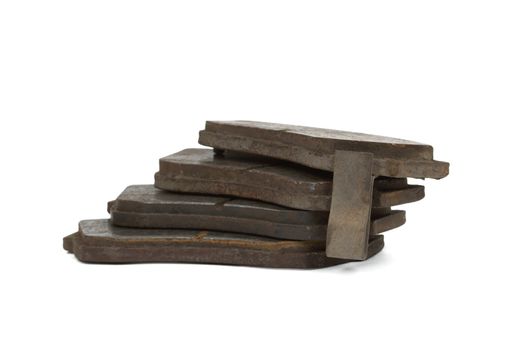 Old brake pads disk brake, isolated on a white background