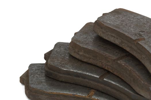 Old brake pads disk brake, isolated on a white background