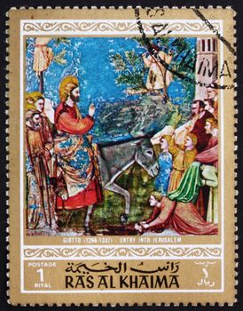 RAS AL-KHAIMAH - CIRCA 1970: a stamp printed in the Ras al-Khaimah shows Entry into Jerusalem, Painting by Giotto di Bondone, Life of Jesus Christ, circa 1970