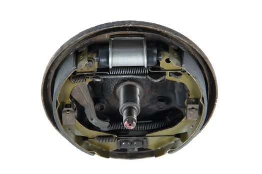 New brake pads and cylinder brake drum, isolated on a white background
