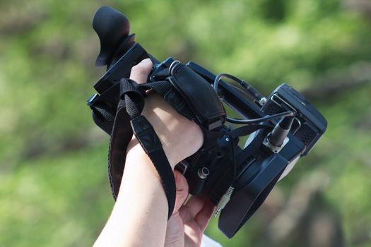 Operator holding a TV camera