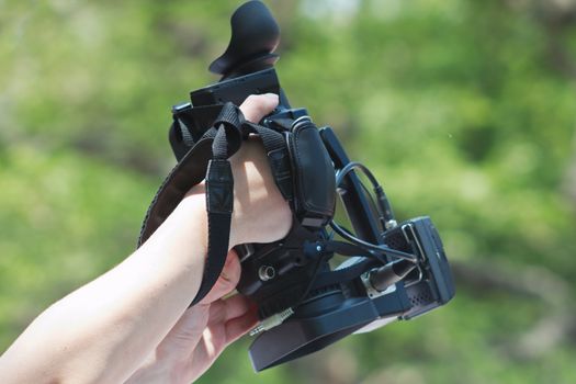 Operator holding a TV camera