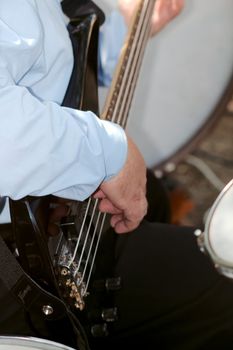 Musician plays the guitar