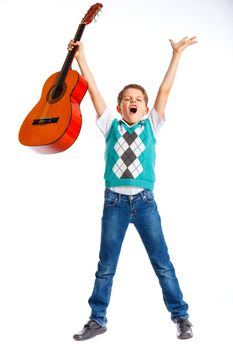 Cute boy with classical guitar. Isolated on white background
