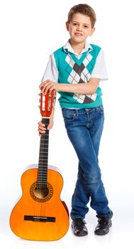 Cute boy with classical guitar. Isolated on white background